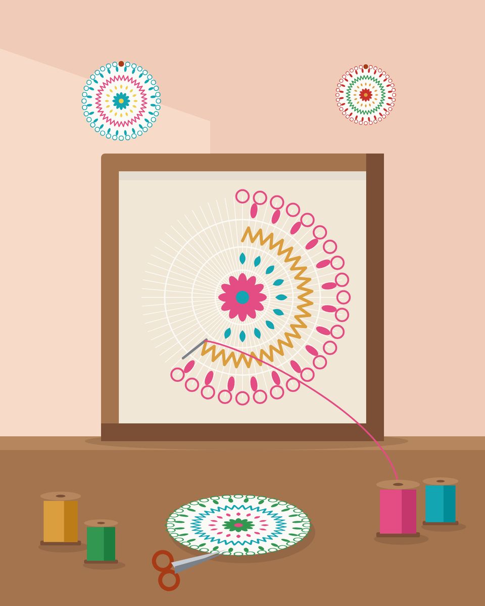 Un ñandutí a medio tejer en su bastidor, con hilos de colores sobre la mesa del taller